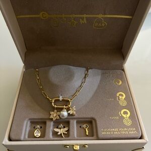 Elegant Gold Charm Necklace with Pearl and Floral Accents